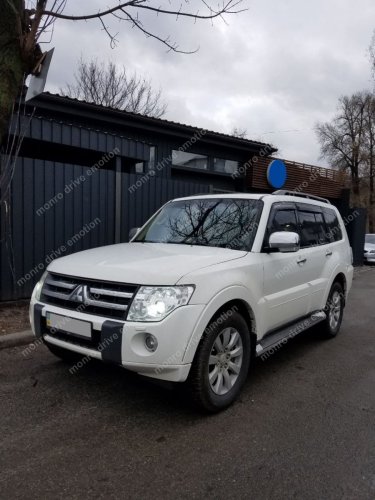 Установка линз Mitsubishi Pagero