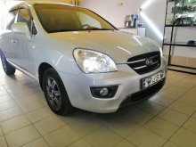 Установка ксеноновых ламп KIA Carens